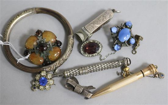 A Chinese rattan and white metal bangle, various hardstone brooches, paste jewellery, propelling pencils, etc.